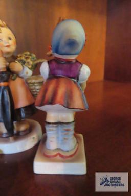 Hummel Little Helper and On Holiday figurines