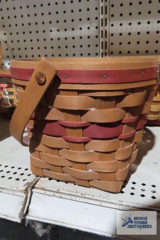 Longaberger 1988 poinsettia basket and 1996 red striped basket