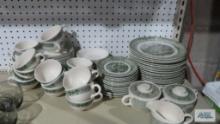 Green painted dinnerware, 16 large plates, 14 small plates, 17 saucers, 19 cups, creamer and sugar