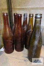 Three Labor Brewing Company antique bottles and three Yough Brewing Company antique bottles
