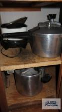 Cupboard of two pressure cookers...and other items