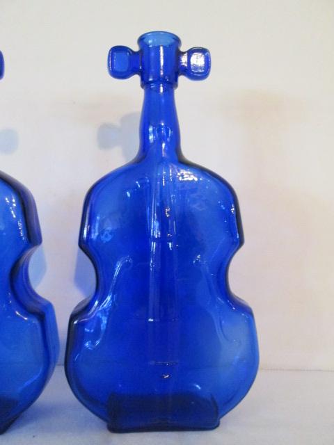 Two Blue Glass Violin Bottles
