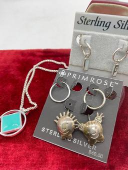 3x pairs of sterling silver earrings with sterling blue stone pendant necklace