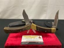 Pair of Vintage Buck 110 Folding Pocket Hunting Knives, Brass and Wooden handles