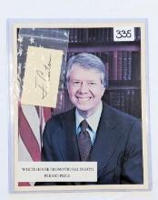 PRESIDENT JIMMY CARTER AUTOGRAPHED CARD AND WHITE HOUSE PROMOTIONAL PHOTO