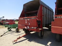 1668. 317-617, GEHL 970 6 FT. FORAGE BOX ON MEYERS TANDEM AXLE WAGON, EXT.