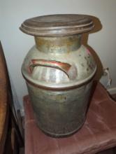 (LR) VINTAGE MILK CANISTER, CHAMPAIGN MARKED, ALL PAINT HAS NEARLY BEEN STRIPPED, 23"H 13"D