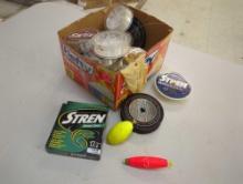 Box of fishing lines and fishing bobbers. Comes as is shown in photos. Appears to be used. 7"W x