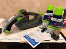 New Bissel Cordless Pet Stain Eraser Model 3180 w/ Charger, 2 Jugs of Product, Manuals