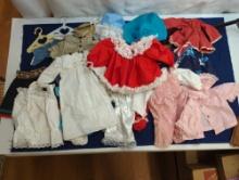 DOLL CLOTHES VARIETY OF DRESSES, PANTS, HATS, 2 AMERICAN GIRL HANGINGS,SMALL CHALK BOARD