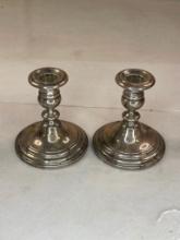 2 sterling candleholders