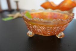 PAIR OF ORANGE CARNIVAL GLASS PCS INCLUDING FLUTED BOWEL AND FOOTED BUTTERF