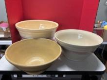 large vintage mixing bowls the brown one is cracked