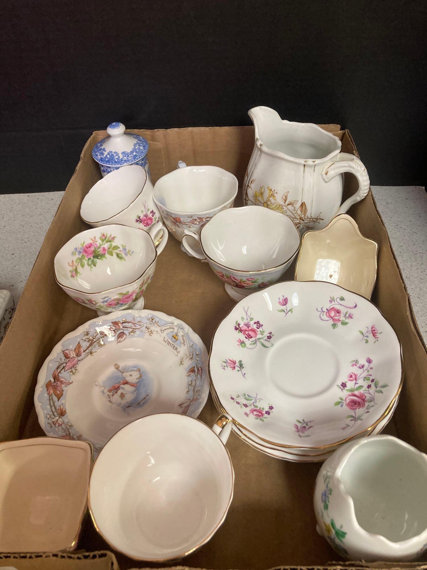 3 flats of porcelain and china vases pitchers tea cups and saucers