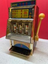 Casino seven $.25 slot machine, metal and plastic