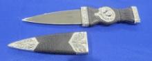 Small Dagger w/ Sheath Small double edged dagger, comes with sheath and is marked China, measures 9"