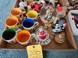 Assortment of Clown Figures and Mugs