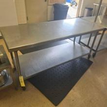 30in x 6ft stainless steel table on casters