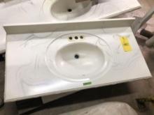Bathroom countertop with integral sink, cultured marble, 46 in. long.