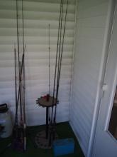 Assorted fishing rods and stand